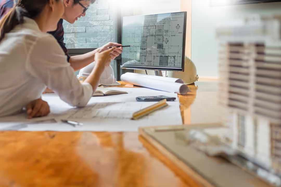 Man Women Working Computer Desk Pointing 3d Software